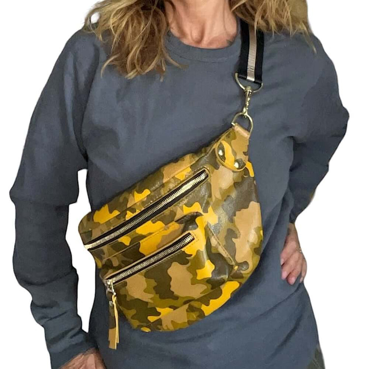 Woman wearing The Joan Yellow Camo Crossbody Bag, showcasing its quality, beauty, and functionality.