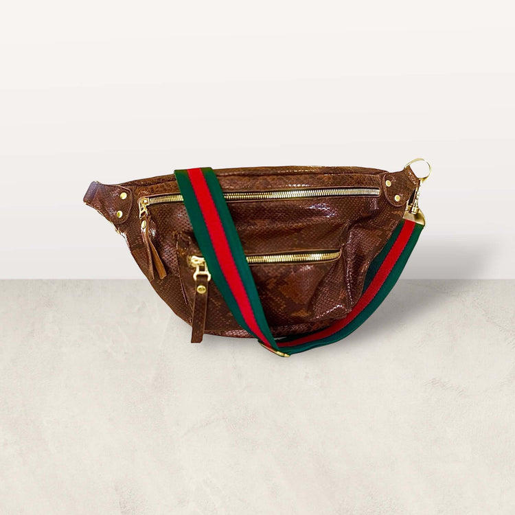 The Joan Brown Snake Crossbody, 100% embossed leather bag with gold hardware and dual zipper pockets.