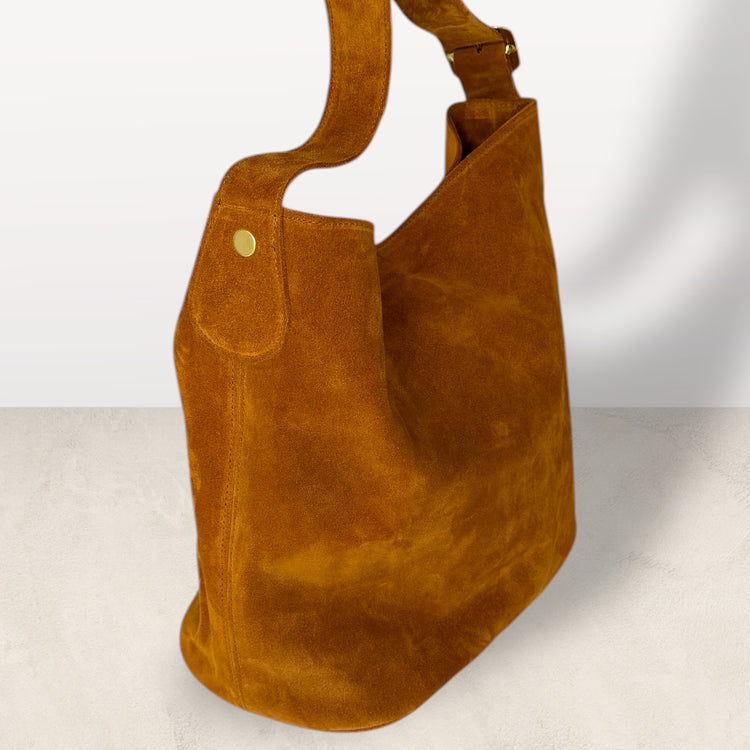 The Keaton Bucket Bag in Caramel Suede